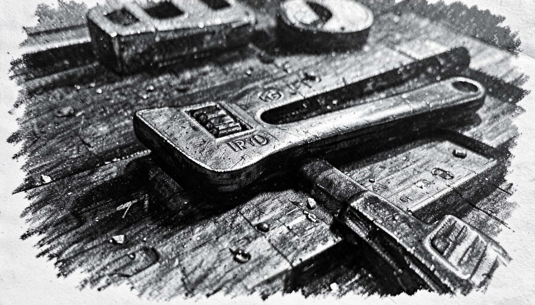 A close-up charcoal drawing of a well-worn torque wrench resting on a dark workshop bench, with deep shadows and textured metallic highlights conveying durability and industrial use.